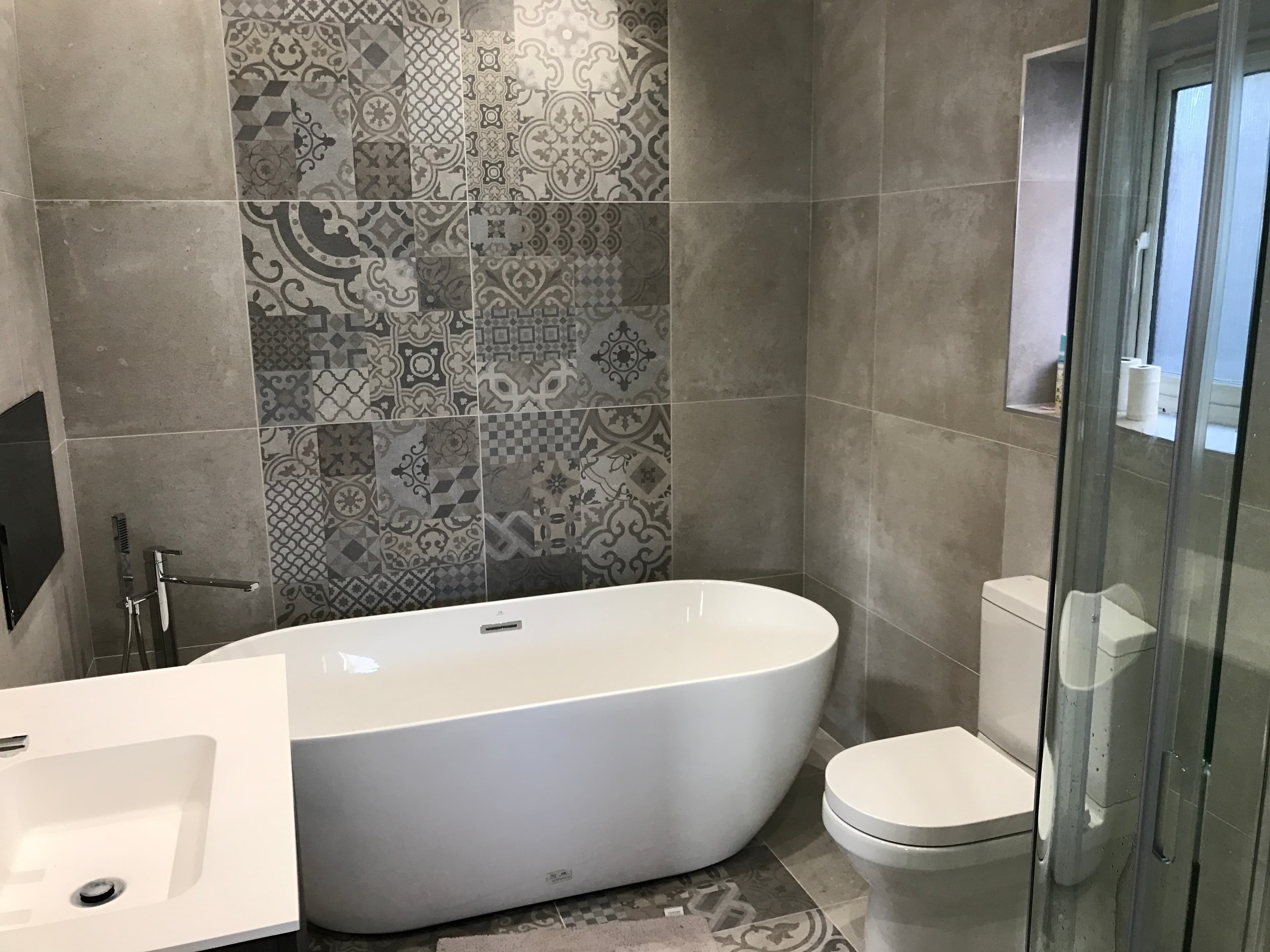 Premium grey bathroom project by SJM Heating