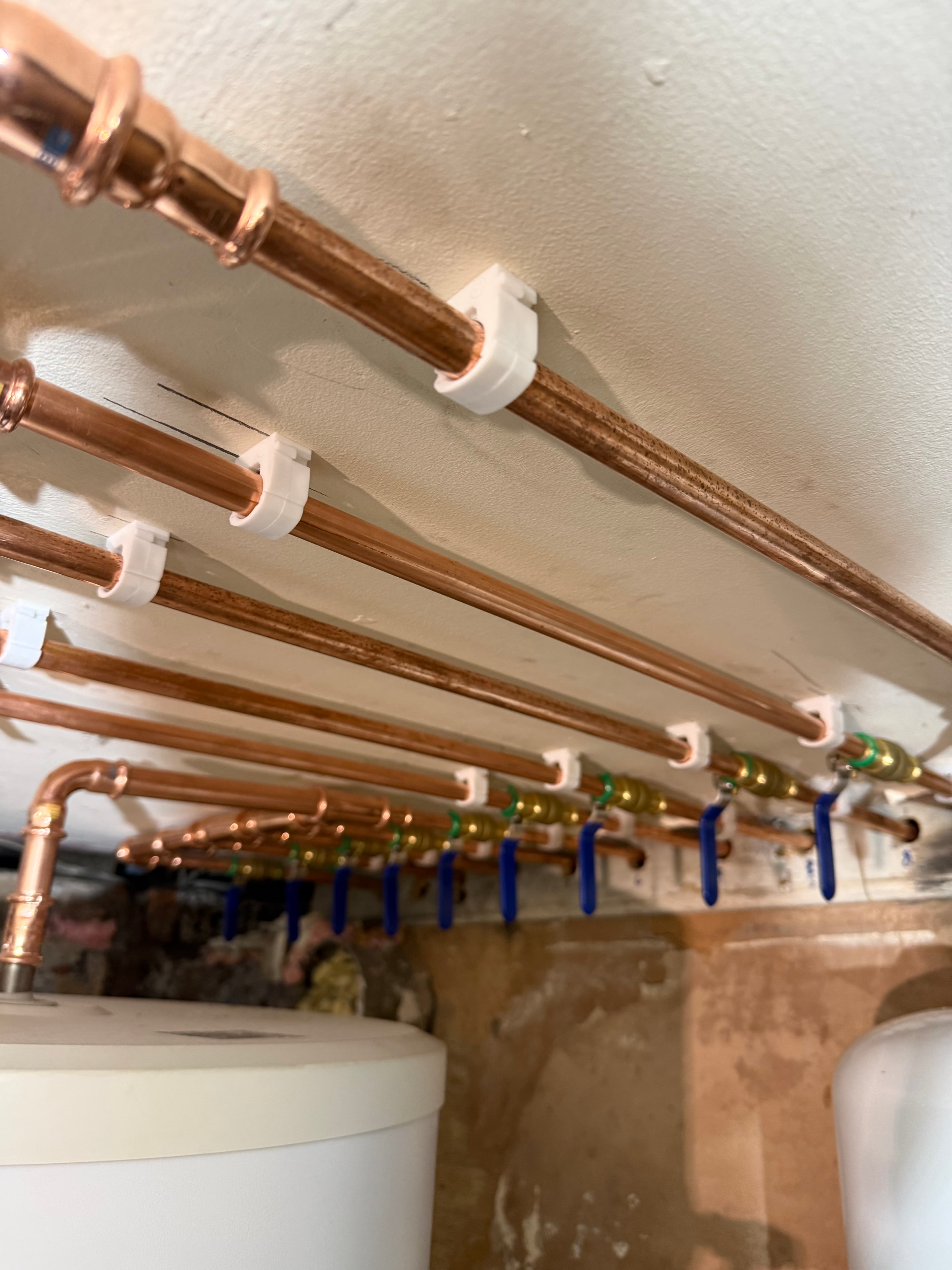 High-quality heating pipework detail representing SJM Heating's workmanship