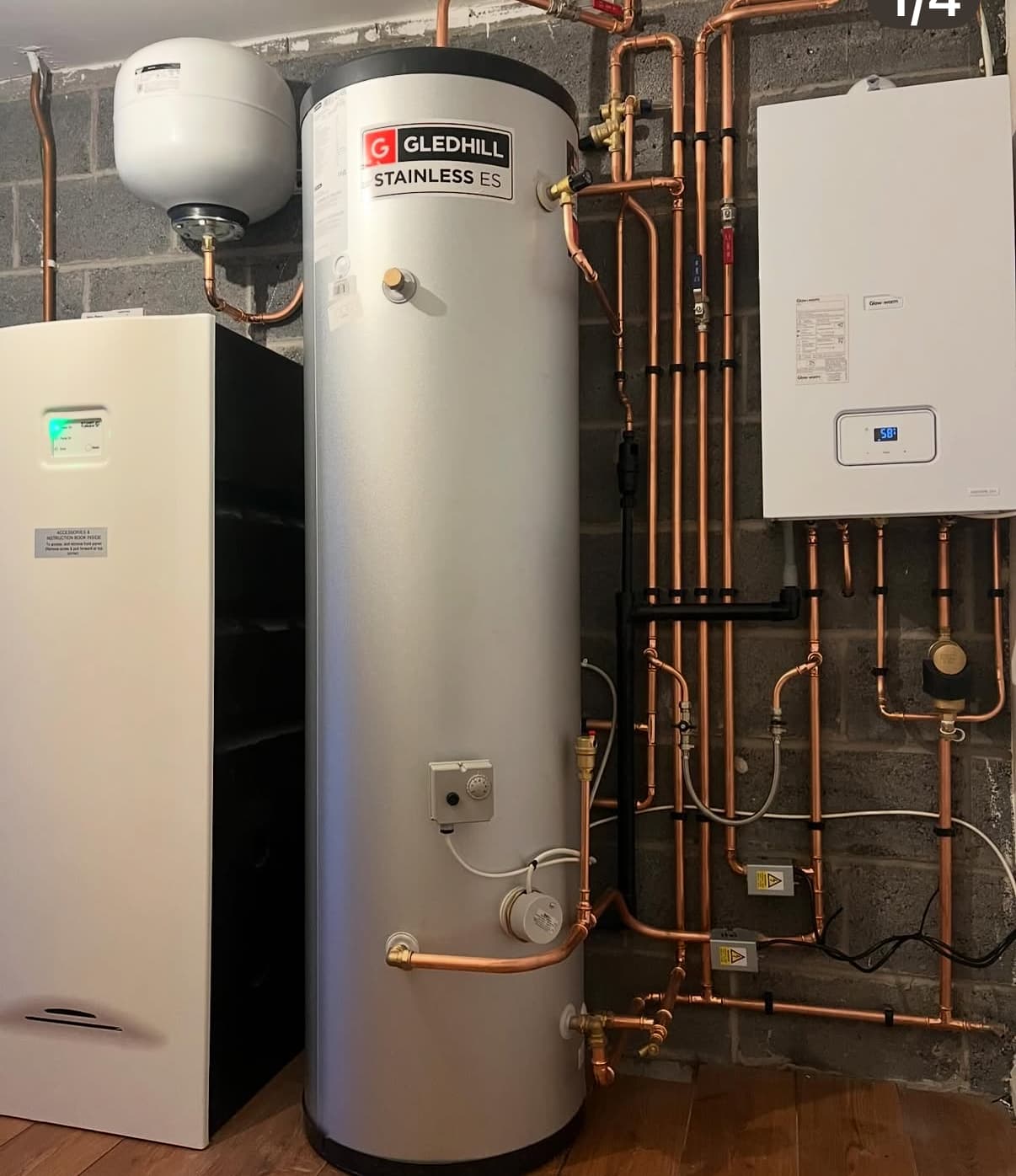 Tidy plant room showing heating system upgrade quality by SJM Heating